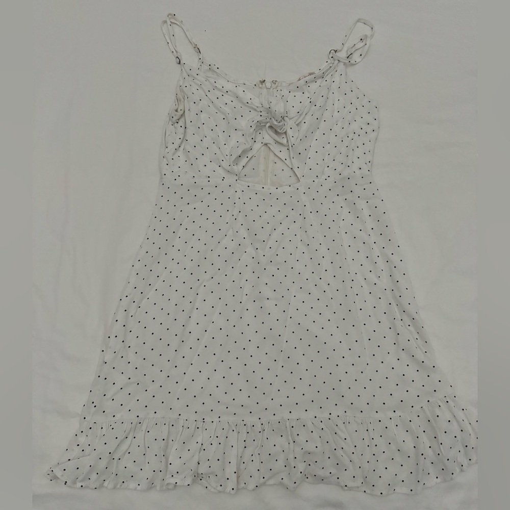 Lottie moss white dress with dark dots that ties in the front